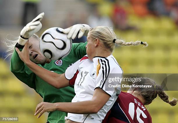 Goalkeeper Val Henderson of the United States tries to save the ball against Lydia Neumann of Germany during the FIFA Women's Under 20 World...