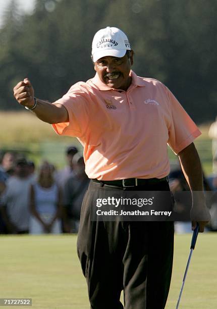 Eduardo Romero of Argentina pumps his fist after sinking a birdie putt on the 18th hole during the final round of the Champions Tour Jeld-Wen...