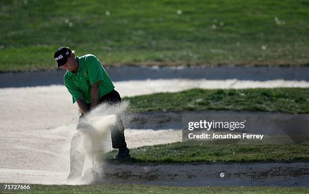 Bob Gilder hits out of the bunker on the 18th hole during the final round of the Champions Tour Jeld-Wen Tradition on August 27, 2006 at The Reserve...