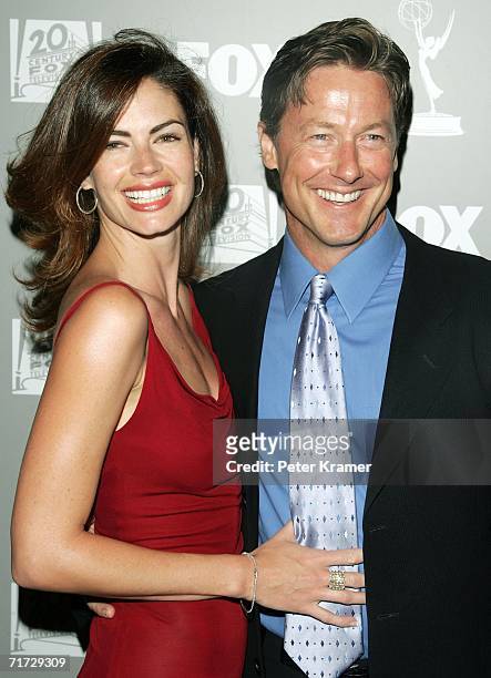 Actors John Allen Nelson and Justine Eyre arrive at the 20th Century Fox Television and FOX Broadcasting Company 2006 Emmy party held at Spago on...