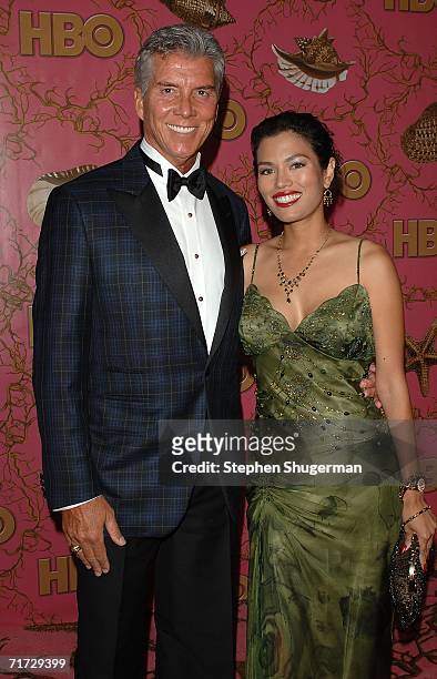 Boxing Ring announcer Michael Buffer and Christine Prado arrive at the HBO Post Emmy Party held at The Plaza at the Pacific Design Center on August...