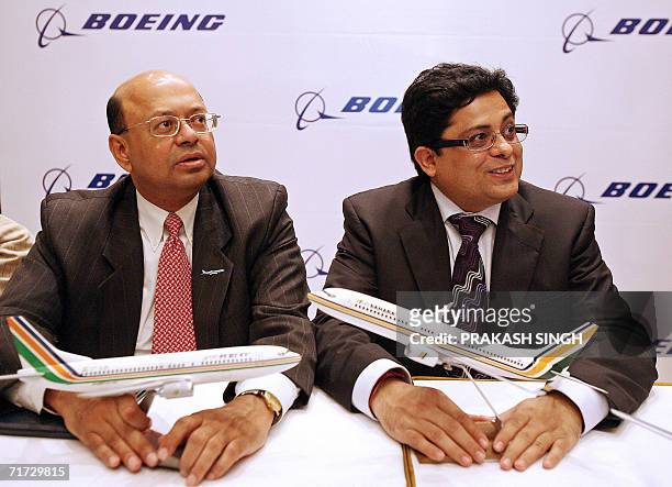 Senior Vice-President, Sales, Boeing Commercial Airplanes, Dinesh Keskar and India's Air Sahara President Alok Sharma pose for media representatives...