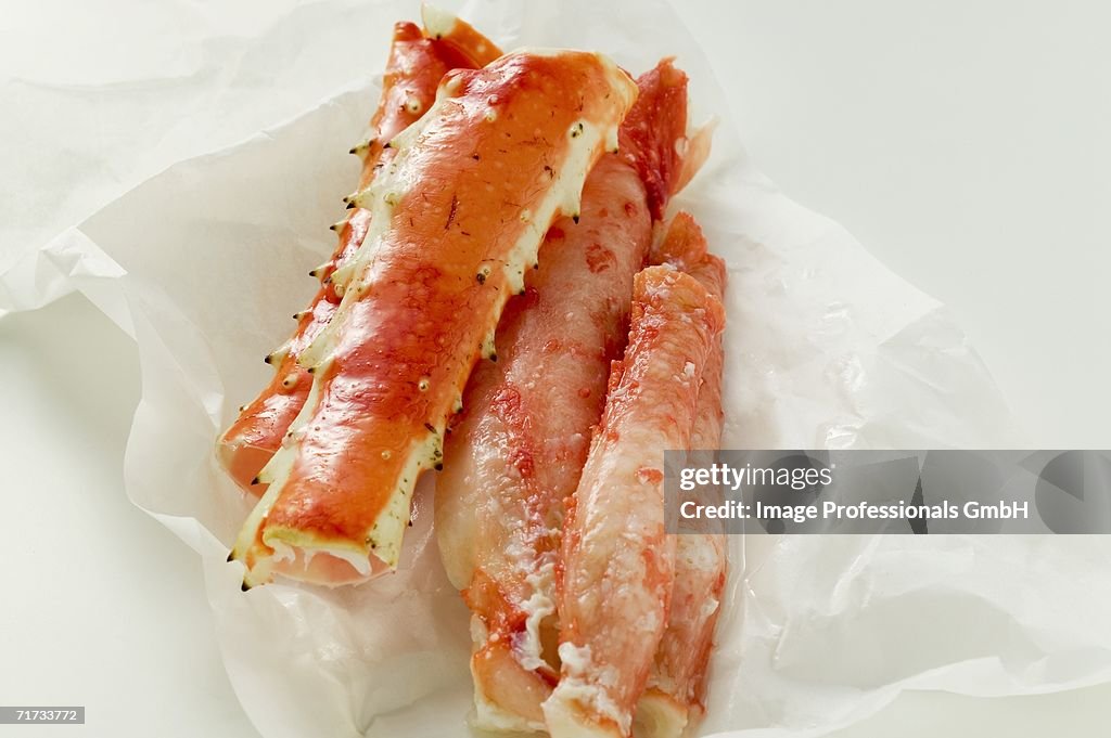 King crab legs on wrapping paper