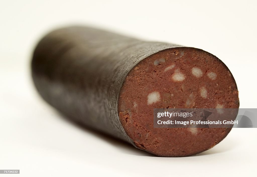 Black pudding, with a piece cut off