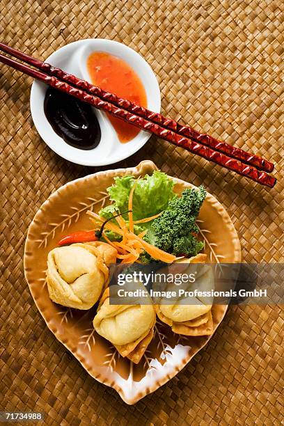 deep-fried wontons with salad and two sauces - hoisin sauce stock pictures, royalty-free photos & images