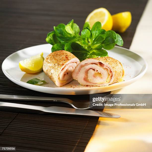 turkey rolls with ham and cheese - cordon bleu stock pictures, royalty-free photos & images