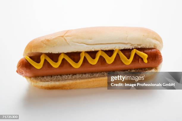 hot dog with mustard - american mustard stock pictures, royalty-free photos & images