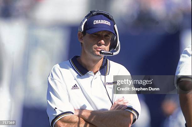 Head Coach Mike Riley of the San Diego Chargers watches the action during the game against the Denver Broncos at Qualcomm Stadium in San Diego,...