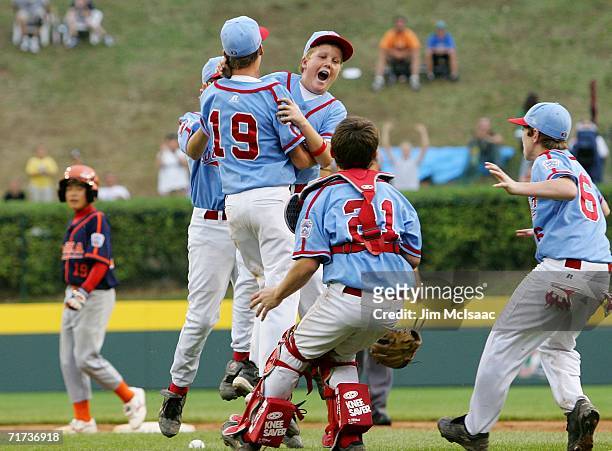 Josh Lester and Kyle Carter of the Southeast team from Columbus, Georgia celebrate after defeating the Asian team from Kawaguchi City, Japan in the...