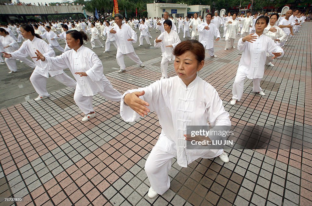 Hundreds of devotees of Taoism perform t