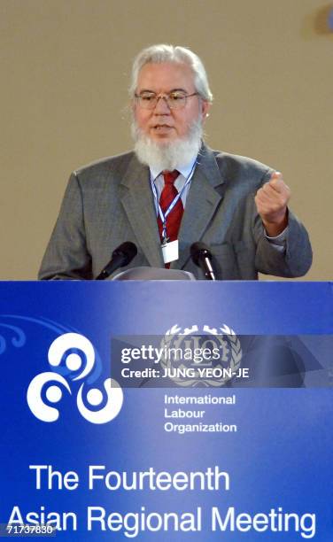 Chilian Juan Somavia , Director-General of the International Labour Organization , delivers a speech during the opening ceremony of the 14th ILO...