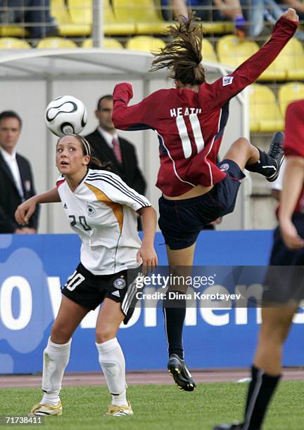 Nadine Kessler of Germany tries to evade Tobin Heath of the United States during the FIFA Women's Under 20 World Championships Quarter-final match...
