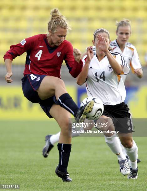 Nikki Krzysik of the United States challenge Anna Blaesse of Germany during the FIFA Women's Under 20 World Championships Quarter-final match between...