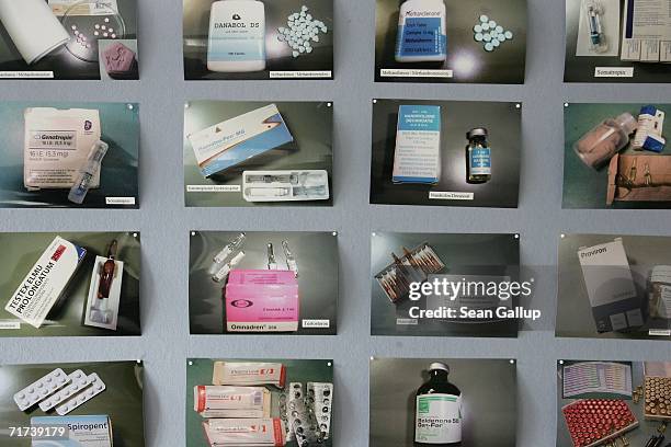 Photos of anabolic steroids confiscated in a police bust earlier in the day stand on display at police headquarters August 29, 2006 in Berlin,...