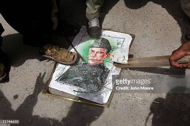 Anti-Pakistan Rioters step on a portrait of Mohammed Ali Jinnah, the father of Pakistan during a violent demonstration August 29, 2006 in Quetta,...