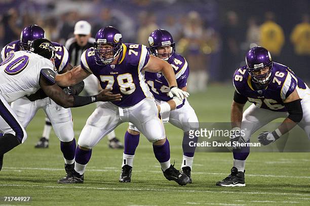 Center Matt Birk of the Minnesota Vikings guards quarterback Brad Johnson against the Baltimore Ravens on August 25, 2006 at the H.H.H. Metrodome in...