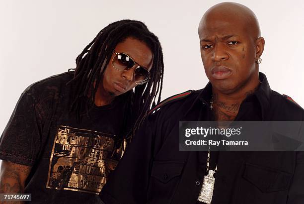 Recording artists Lil Wayne and Birdman pose for photos at Michaelson Studio August 29, 2006 in New York City.