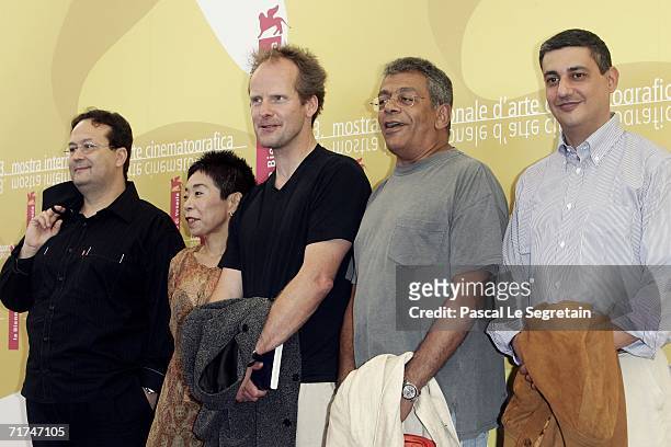 Director Carlo Carlei, Keiko Kusakabe, directors Philip Groning and Yousri Nasrallah and writer Giuseppe Cenna pose during the 'Venezia 63' Jury...