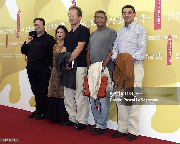 Director Carlo Carlei, Keiko Kusakabe, directors Philip Groning and Yousri Nasrallah and writer Giuseppe Cenna pose during the 'Venezia 63' Jury...