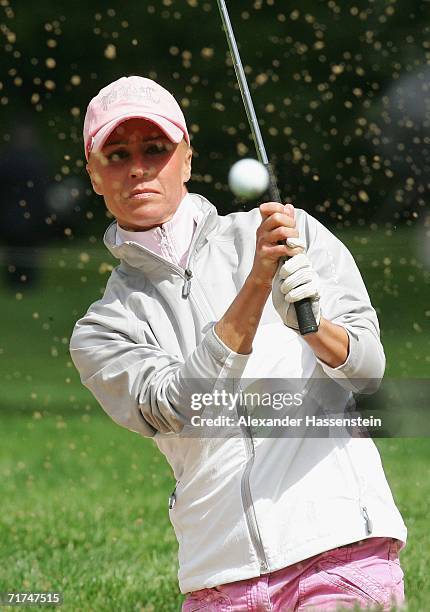 German TV presenter Sonja Zietlow plays a bunker shot during the BMW International Open 2006 on August 30, 2006 in Munich, Germany. The Tournament,...