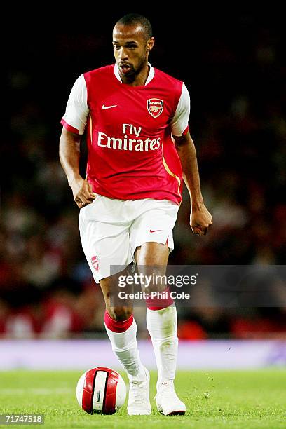 Thierry Henry of Arsenal runs with the ball during the UEFA Champions League Qualification Third qualifying round, second leg match between Arsenal...