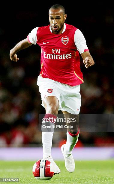 Thierry Henry of Arsenal runs with the ball during the UEFA Champions League Qualification Third qualifying round, second leg match between Arsenal...