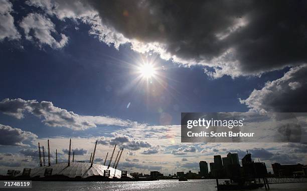 Clouds pass over the Millennium Dome and Canary Wharf on August 30, 2006 in London, England. The Millennium Dome is currently the favourite in the...