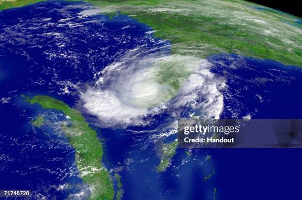 In this satellite image provided by the National Oceanic and Atmospheric Administration, Tropical Storm Ernesto is shown at 10:15am EDT over southern...