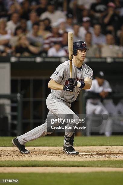 Joe Mauer of the Minnesota Twins at bat during the game against the Chicago White Sox at U.S. Cellular Field in Chicago, Illinois on July 25, 2006....