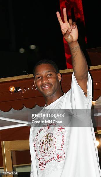 Player Tracy McGrady of the Houston Rockets gestures to fans during his second visit to Hong Kong on August 30, 2006 in Hong Kong, China.