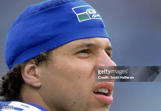 Chad Brown of the Seattle Seahawks looks on from the sidelines during the game against the Carolina Panthers at the Ericsson Stadium in Charlotte,...