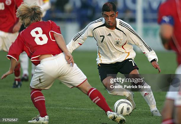 Ashkan Dejagah, of Germany fights for the ball with Antoine Rey of Switzerland during the Under 20 friendly match between Switzerland and Germany at...