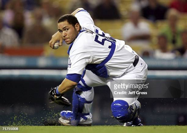 Russell Martin of the Los Angeles Dodgers throws the ball to first base in the 9th inning against the Cincinnati Reds August 30, 2006 at Dodger...