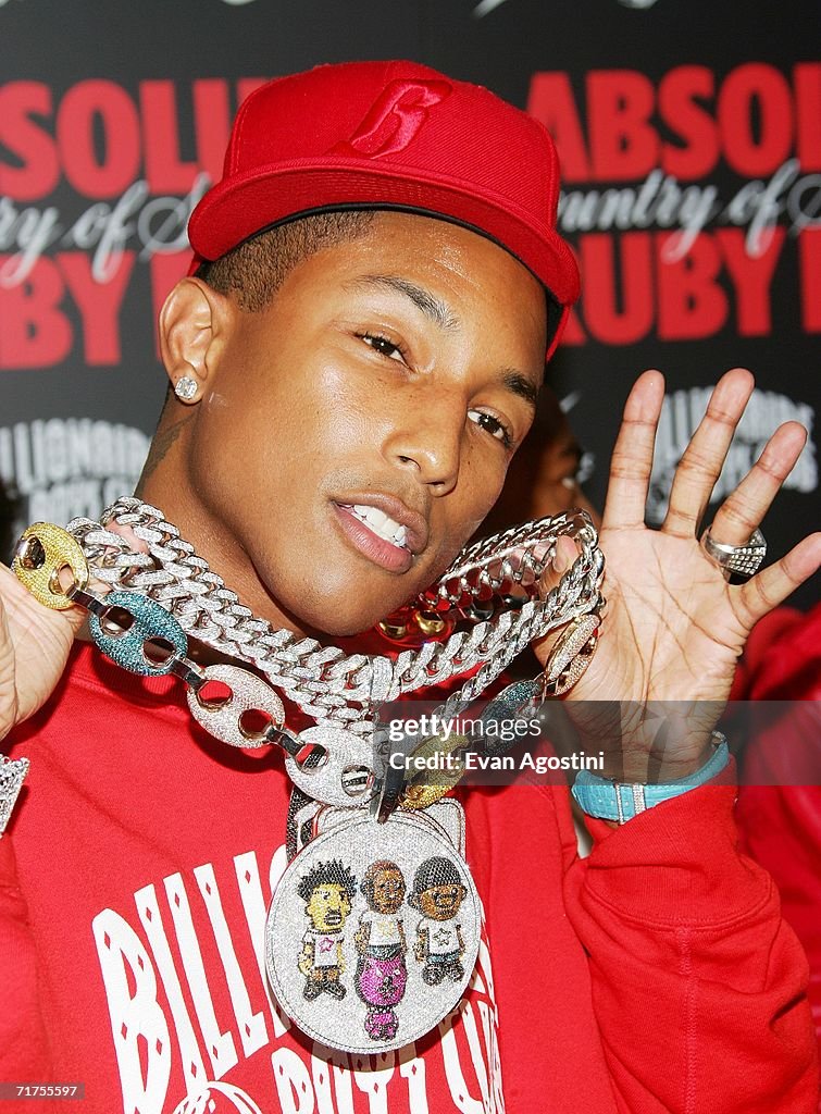 Hip-hop artist Pharrell Williams arrives at the Pharrell Williams