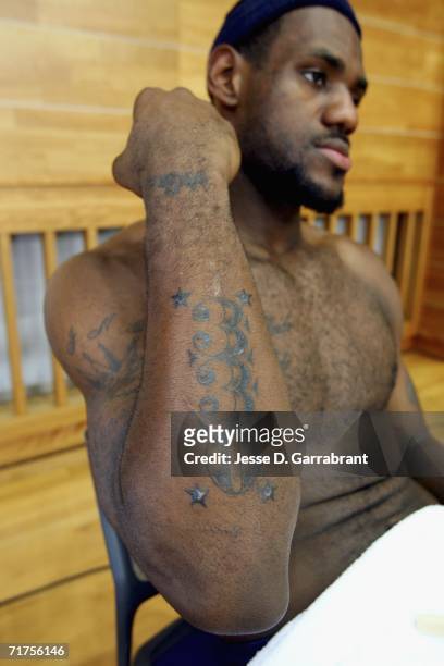 LeBron James of the USA Basketball Mens National Team shows off his new tattoo at practice during the FIBA World Basketball Championship at the Japan...