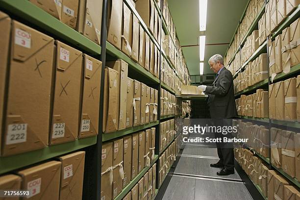 File is removed by a member of staff from a depository at The National Archives on August 31, 2006 in London, England. The National Archives have...