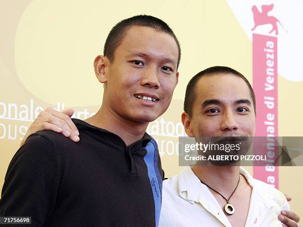 Actor Sakoa Kaewbuadee and director Apichatpong Weerasthakul pose during a photocall for their film "Sang sattawat Syndromes And A Century" at...