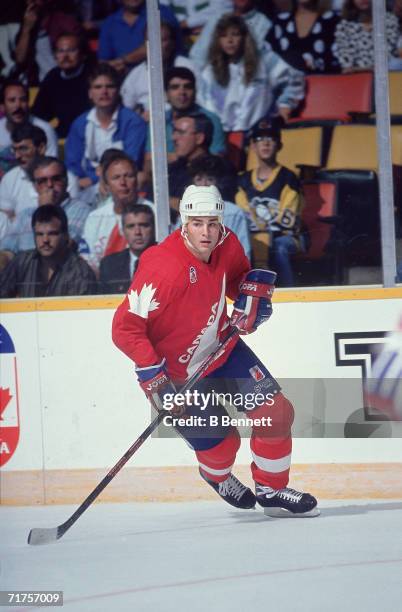 Canadian professional hockey player Eric Lindros, center for the Oshawa Generals, skates on the ice as a member of Team Canada during a game of the...