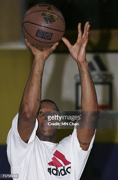 Player Tracy McGrady of the Houston Rockets demonstrates his skills during a ceremony to launch an Adidas shoe at his second visit to Hong Kong on...