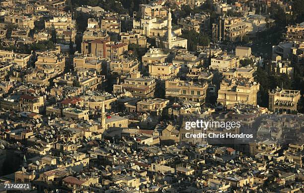 Mosques and low-rise buildings cover the cityscape as viewed from Mount Qaysun August 31, 2006 overlooking Damascus, Syria. Life in Damascus under...