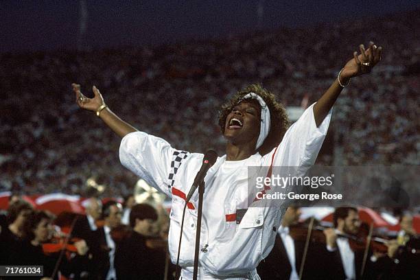 Whitney Houston sings the National Anthem before a game with the New York Giants taking on the Buffalo Bills prior to Super Bowl XXV at Tampa Stadium...