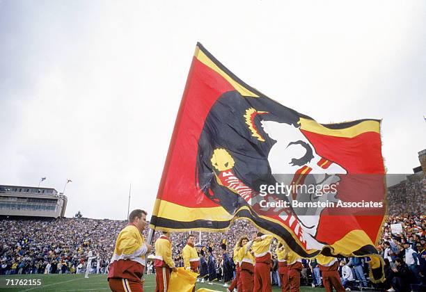 The Florida State Seminoles cheer team flies the school banner before game action against the Notre Dame Fighting Irish on September 28, 1991 at...
