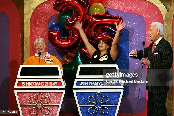 Host Bob Barker announces the showcase showdown at the taping of the 35th Season premiere of "The Price Is Right" at CBS Television studios August...