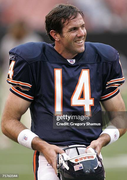 Brian Griese of the Chicago Bears smiles during a pre-play during the preseason game against the Cleveland Browns at Cleveland Browns Stadium on...