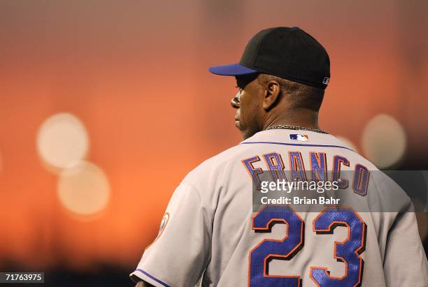 First baseman Julio Franco of the New York Mets mans first base as the sun sets in a game against the Colorado Rockies on August 31, 2006 at Coors...