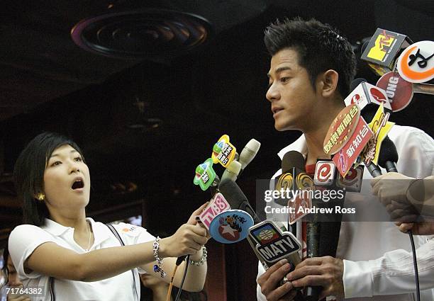 Singer Aaron Kwok attends the launch of new adidas shop in Tsim Tsa Tsui on August 31, 2006. In Hong Kong, China.