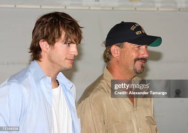 Actors Ashton Kutcher and Kevin Costner make an appearance at the US Coast Guard base in Opa Locka Airport to promote the movie "The Guardian" on...