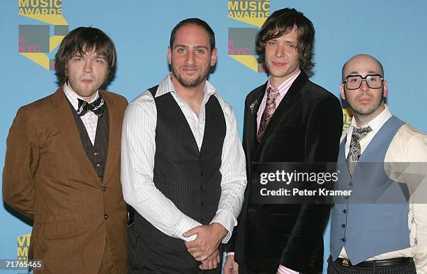 Musical group OK go pose in the press room during the 2006 MTV Video Music Awards at Radio City Music Hall August 31, 2006 in New York City.