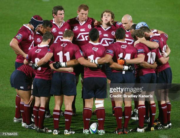 The Reds team huddle together before the Rugby match between the Queensland Reds and a Fiji Development team at Ballymore on September 1, 2006 in...