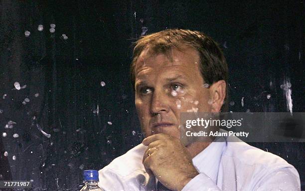 Stuart Raper of the Sharks watches from the coaches box during the round 26 NRL match between the Cronulla-Sutherland Sharks and the Canberra Raiders...